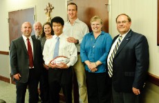 Peyton Manning with 2012 PeyBack Foundation Scholarship Recipient, Jeffrey Zhao. Photo Courtesy of Maya Laurent. Peyton Manning with 2012 PeyBack Foundation Scholarship Recipient, Jeffrey Zhao. Photo Courtesy of Maya Laurent.
